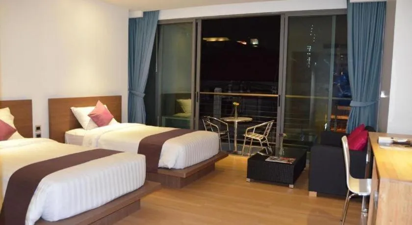 Bed in The Scenery City Hotel