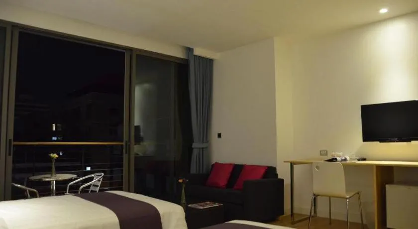 Bed in The Scenery City Hotel