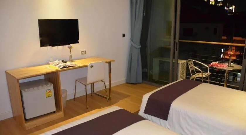 Bed in The Scenery City Hotel