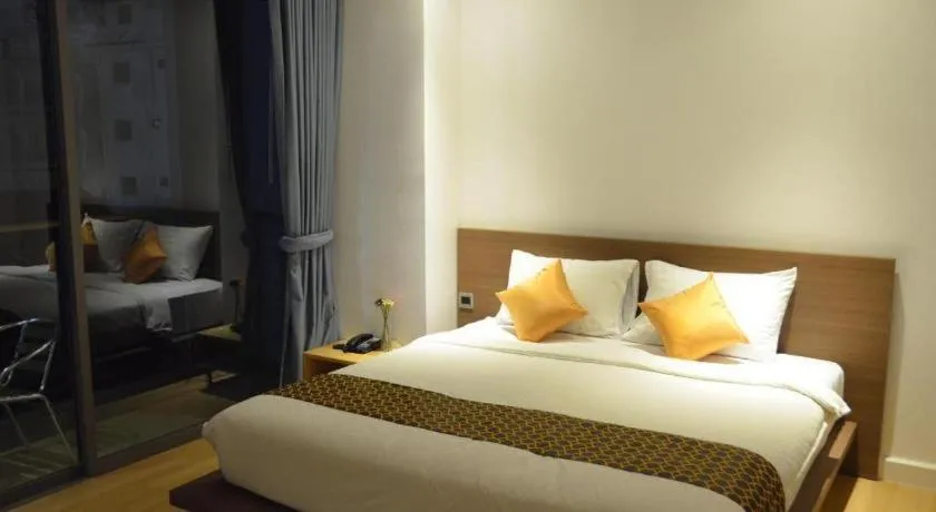 Bed in The Scenery City Hotel