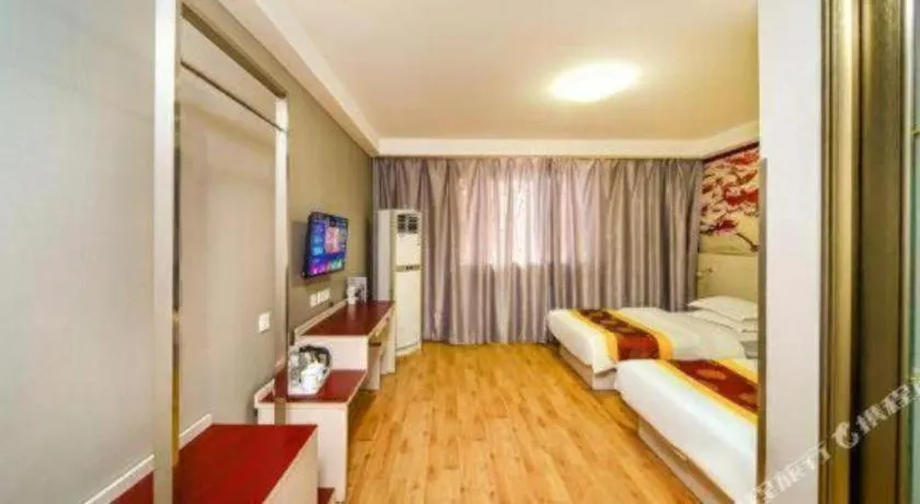 Bed in Kunlun Leju Business Hotel Kaifeng Gulou