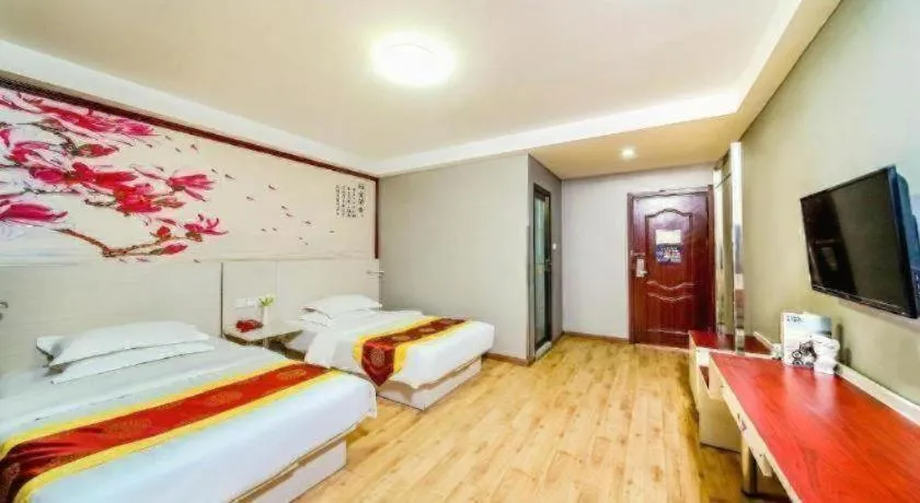 Bed in Kunlun Leju Business Hotel Kaifeng Gulou