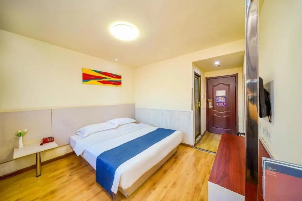 Bed in Kunlun Leju Business Hotel Kaifeng Gulou