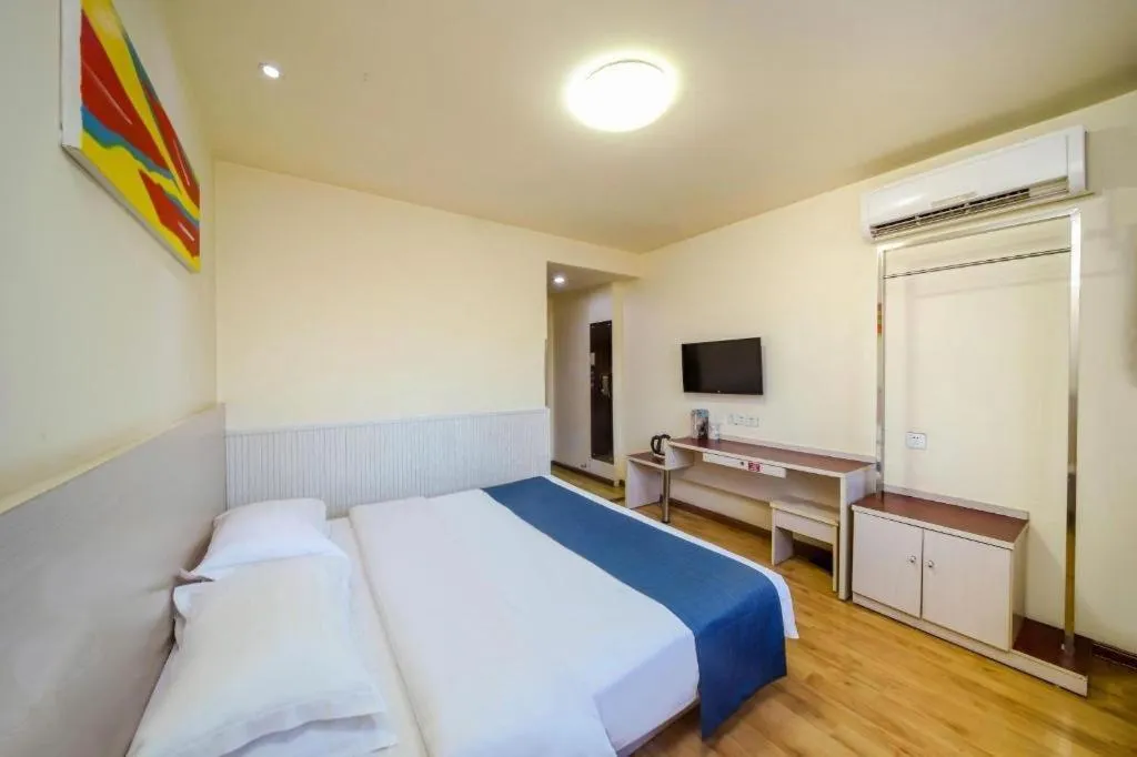 Bed in Kunlun Leju Business Hotel Kaifeng Gulou