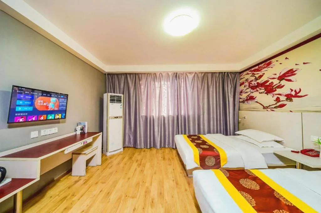 Bed in Kunlun Leju Business Hotel Kaifeng Gulou