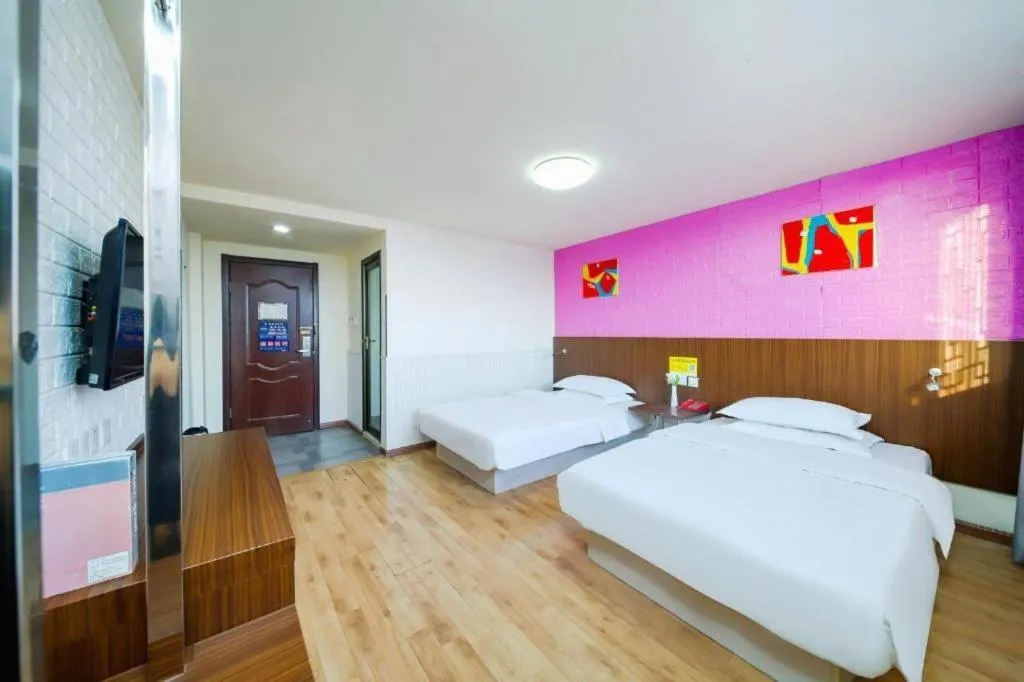 Bed in Kunlun Leju Business Hotel Kaifeng Gulou