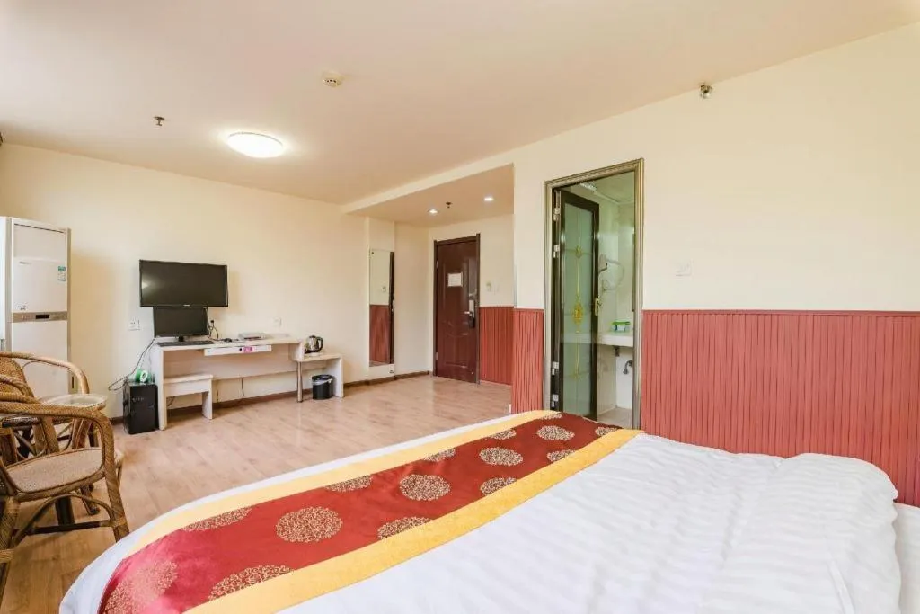 Bed in Kunlun Leju Business Hotel Kaifeng Gulou