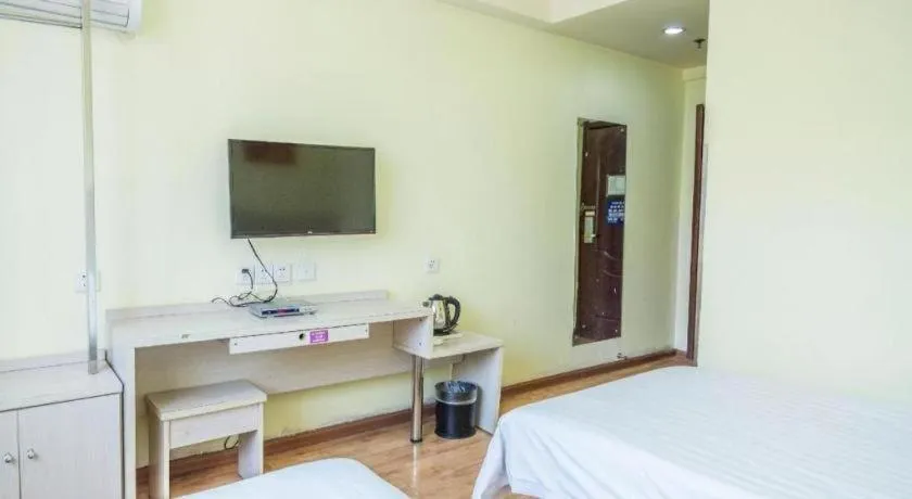 Bed in Kunlun Leju Business Hotel Kaifeng Gulou