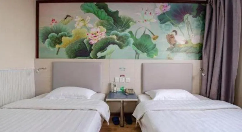 Bed in Kunlun Leju Business Hotel Kaifeng Gulou