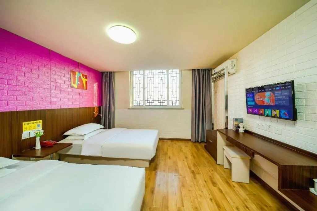 Bed in Kunlun Leju Business Hotel Kaifeng Gulou