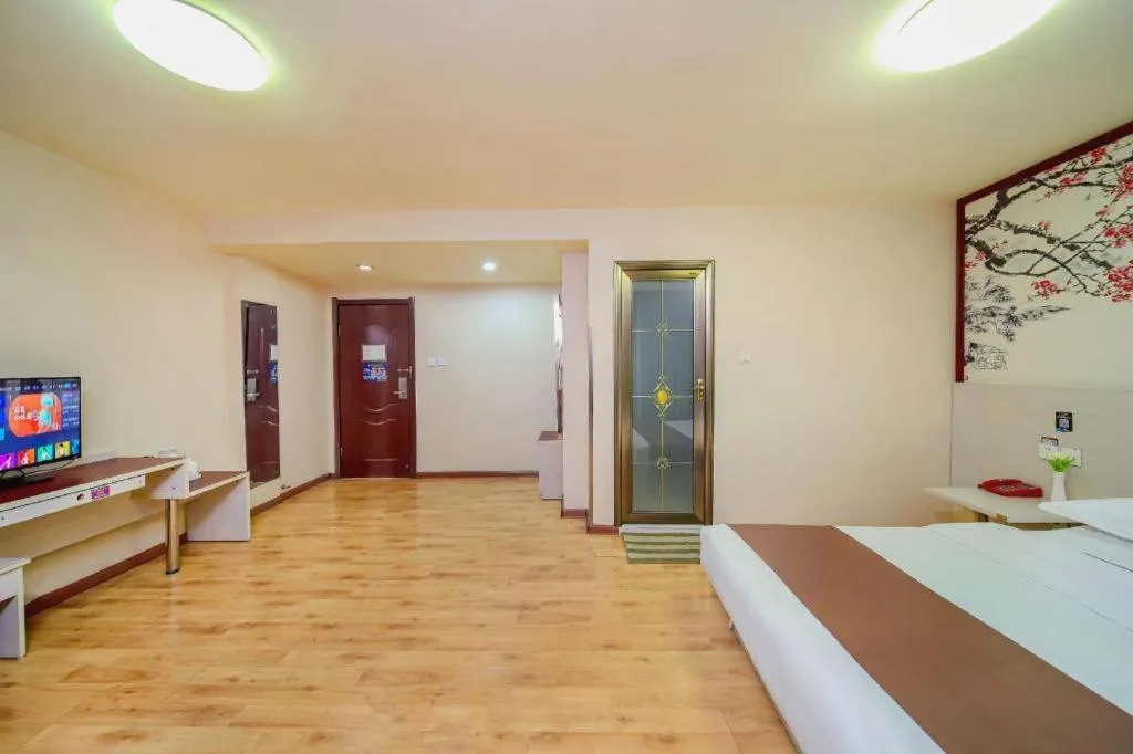 Bed in Kunlun Leju Business Hotel Kaifeng Gulou