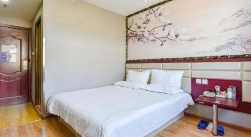 Bed in Kunlun Leju Business Hotel Kaifeng Gulou