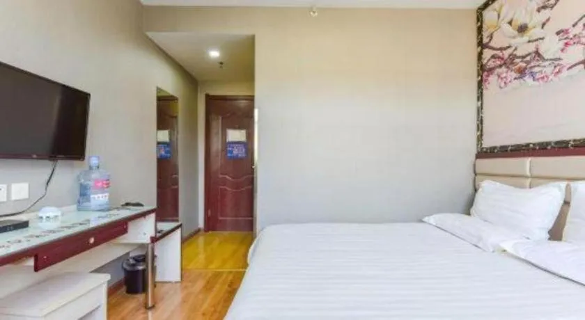 Bed in Kunlun Leju Business Hotel Kaifeng Gulou