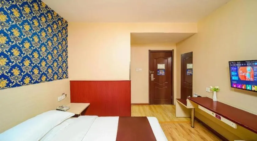 Bed in Kunlun Leju Business Hotel Kaifeng Gulou