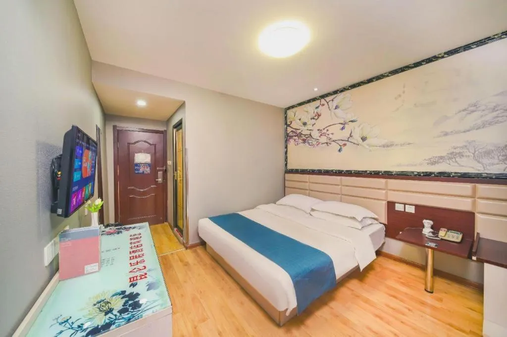 Bed in Kunlun Leju Business Hotel Kaifeng Gulou
