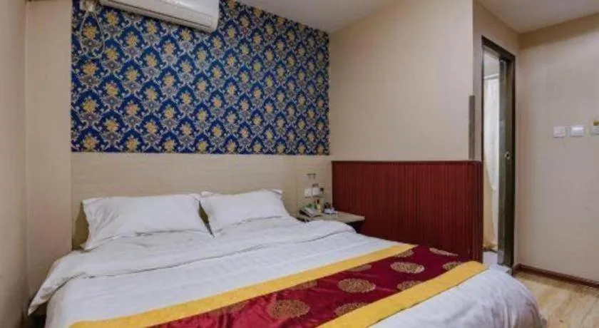 Bed in Kunlun Leju Business Hotel Kaifeng Gulou