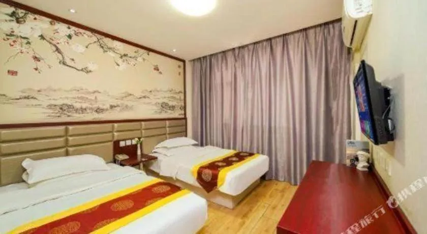 Bed in Kunlun Leju Business Hotel Kaifeng Gulou