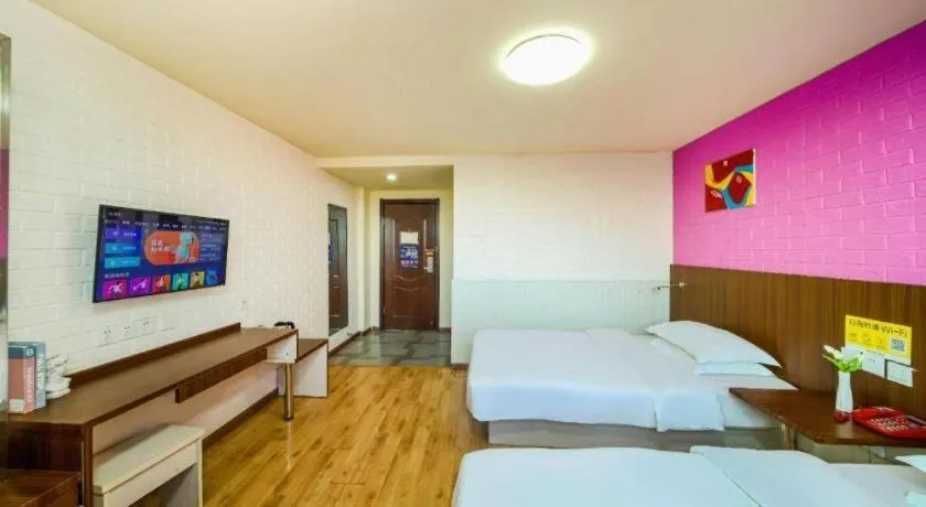 Bed in Kunlun Leju Business Hotel Kaifeng Gulou