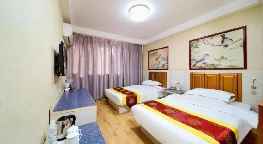 Bed in Kunlun Leju Business Hotel Kaifeng Gulou
