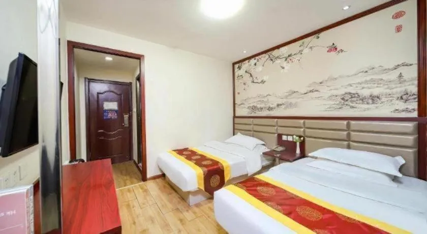 Bed in Kunlun Leju Business Hotel Kaifeng Gulou