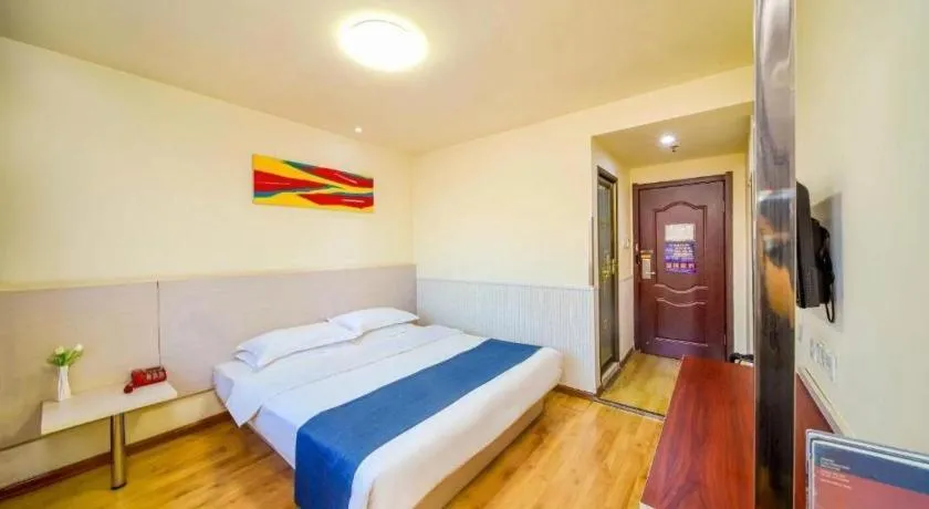 Bed in Kunlun Leju Business Hotel Kaifeng Gulou