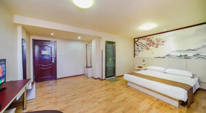 Bed in Kunlun Leju Business Hotel Kaifeng Gulou