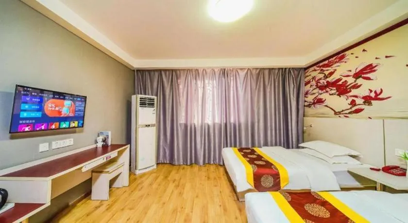 Bed in Kunlun Leju Business Hotel Kaifeng Gulou