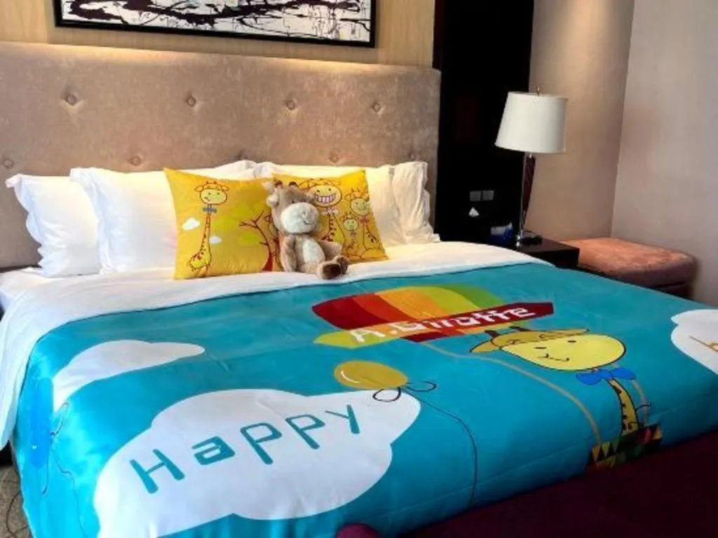 Bed in Wuhan Soluxe Hotel