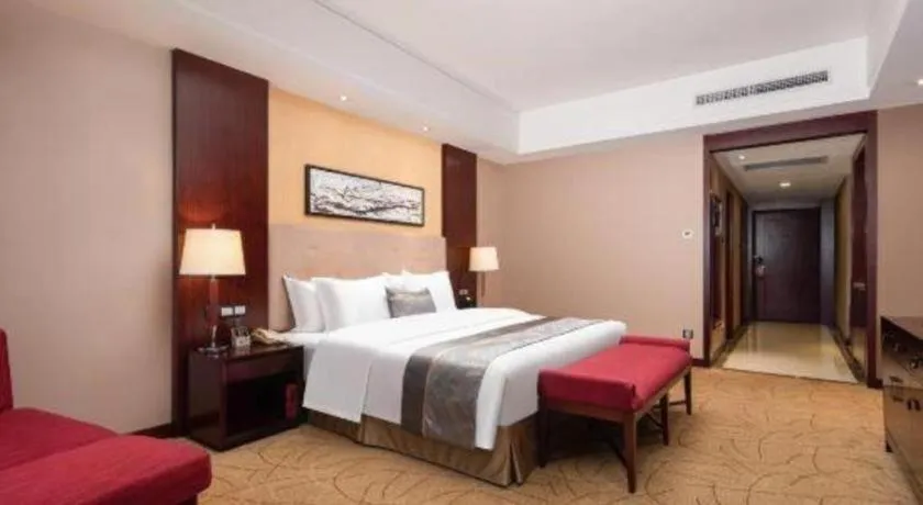 Bed in Wuhan Soluxe Hotel