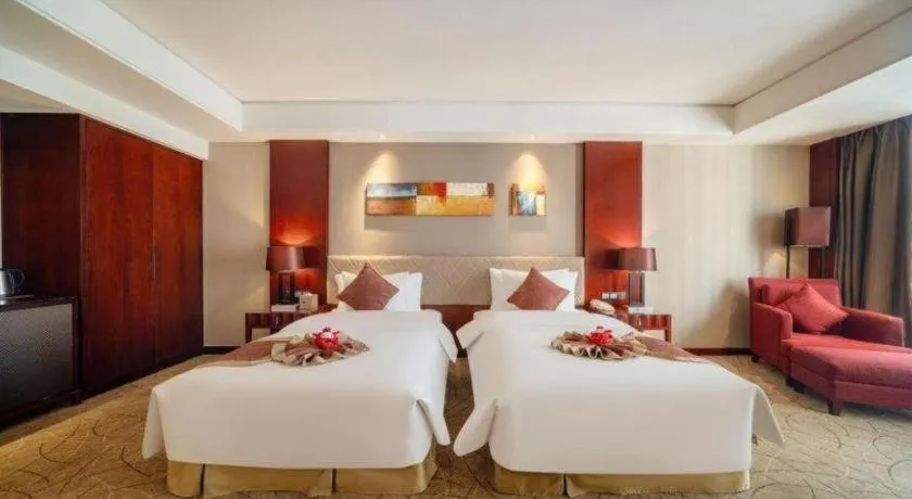 Bed in Wuhan Soluxe Hotel