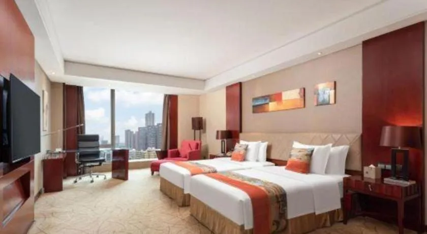 Bed in Wuhan Soluxe Hotel