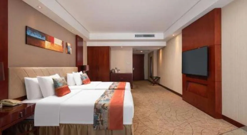 Bed in Wuhan Soluxe Hotel