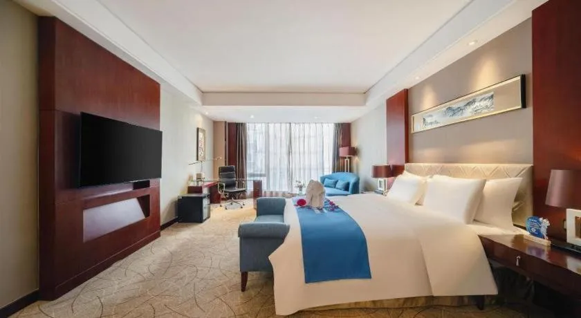 Bed in Wuhan Soluxe Hotel