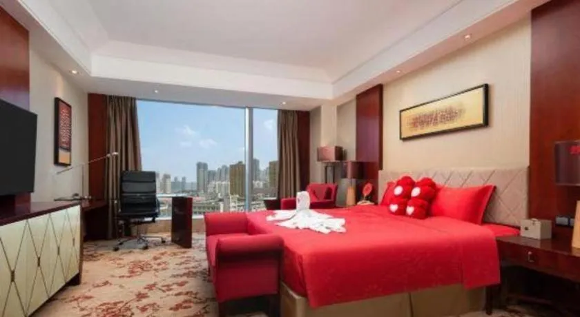 Bed in Wuhan Soluxe Hotel