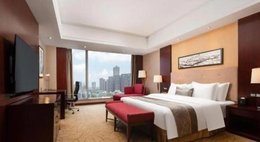 Bed in Wuhan Soluxe Hotel