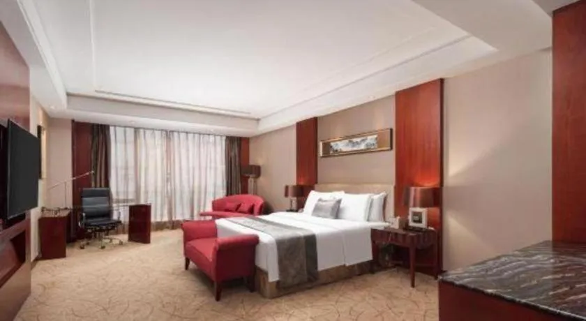 Bed in Wuhan Soluxe Hotel