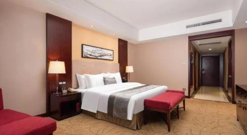 Bed in Wuhan Soluxe Hotel