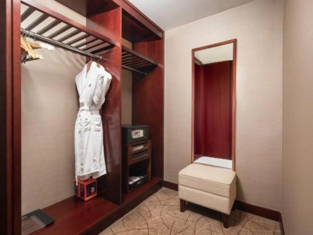 Bed in Wuhan Soluxe Hotel