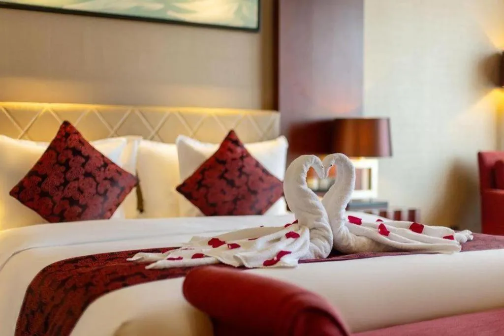 Bed in Wuhan Soluxe Hotel