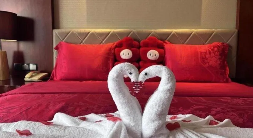 Bed in Wuhan Soluxe Hotel