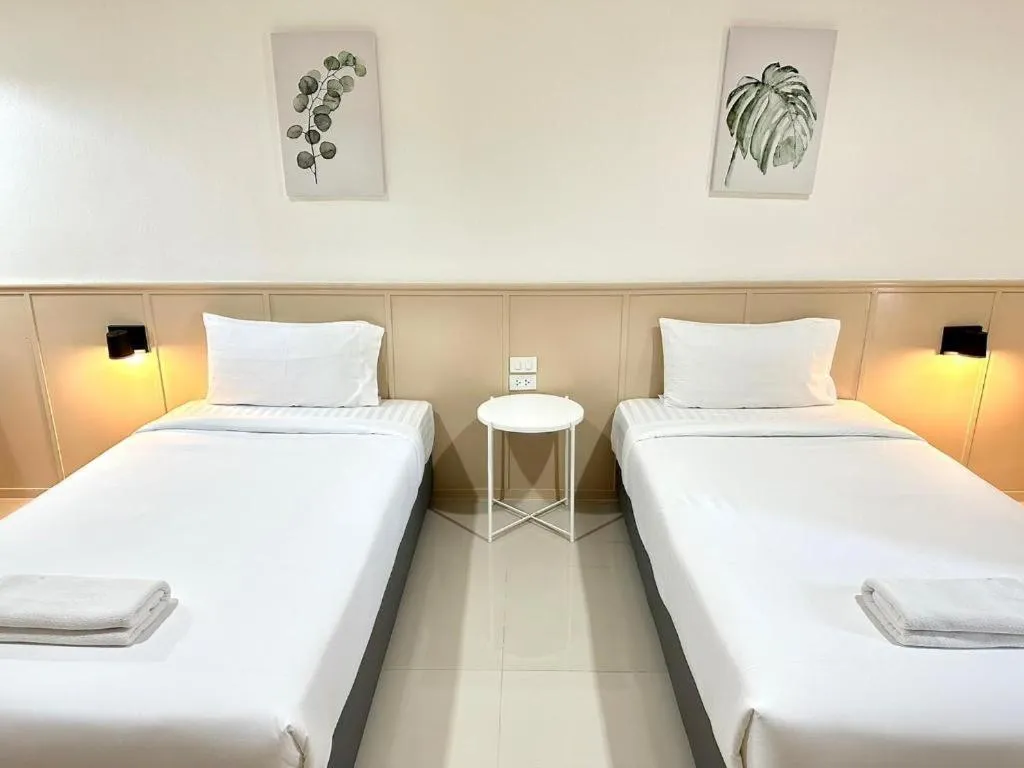 Bed in Grand PL Ville Hotel