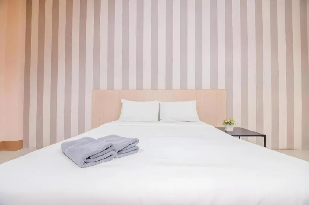 Bed in Grand PL Ville Hotel