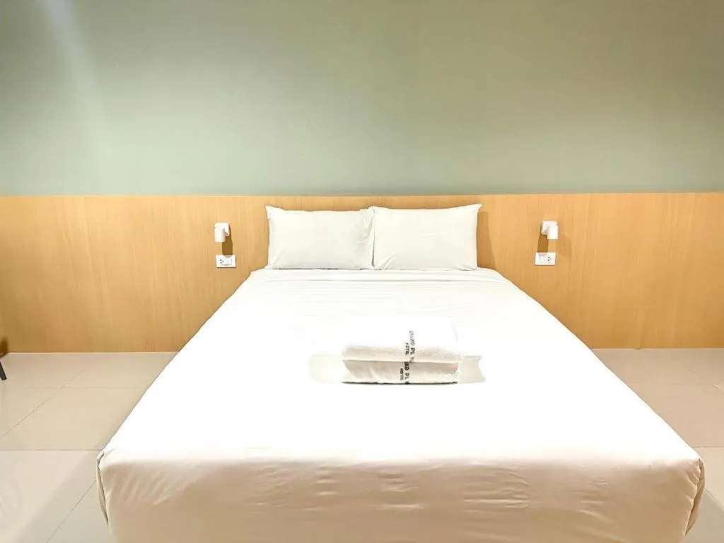 Bed in Grand PL Ville Hotel