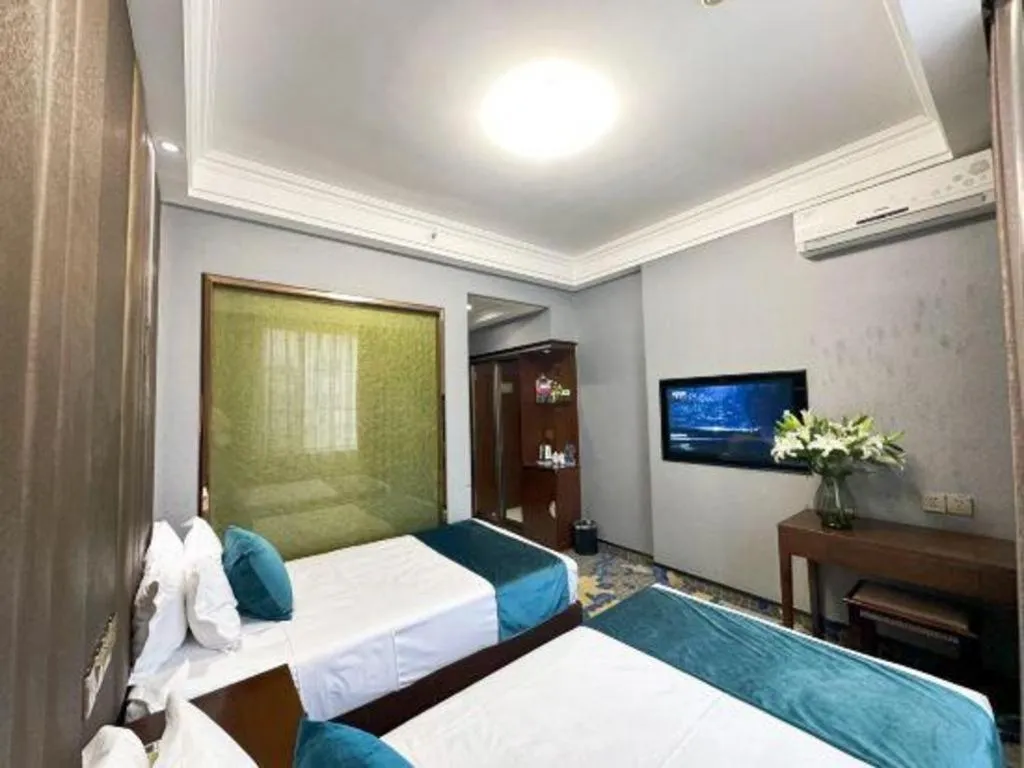 Bed in Dunhuang Dunhe Hotel