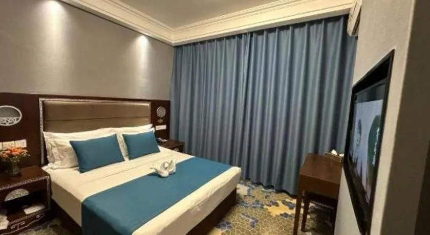 Bed in Dunhuang Dunhe Hotel