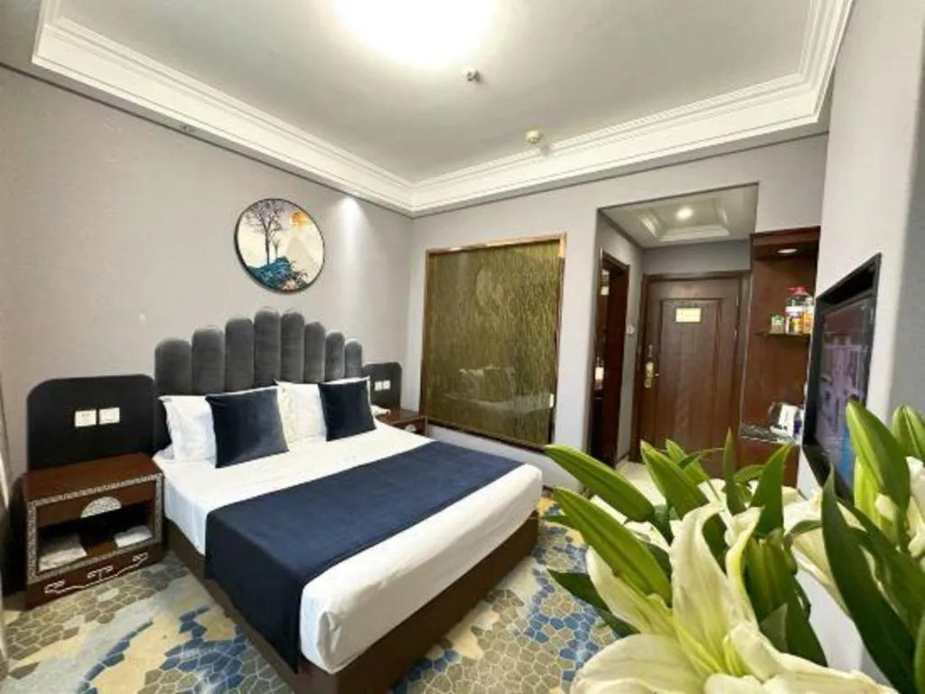 Bed in Dunhuang Dunhe Hotel