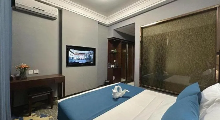 Bed in Dunhuang Dunhe Hotel