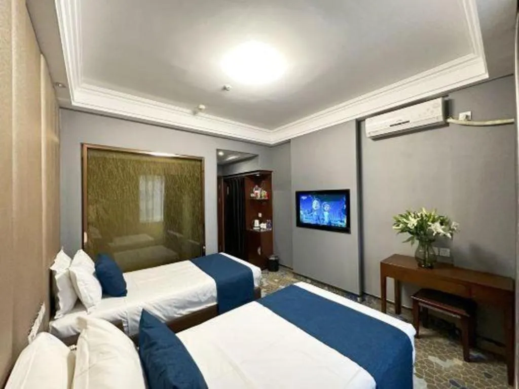 Bed in Dunhuang Dunhe Hotel