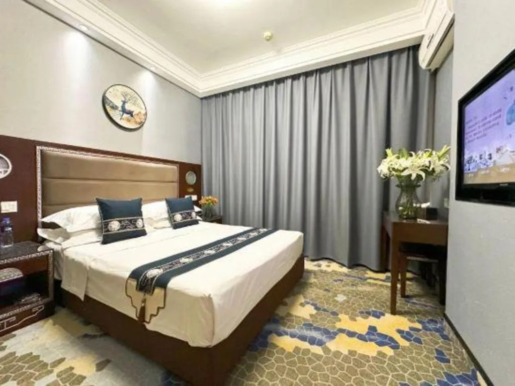 Bed in Dunhuang Dunhe Hotel
