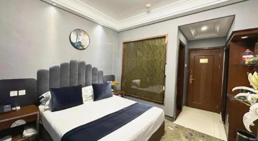Bed in Dunhuang Dunhe Hotel
